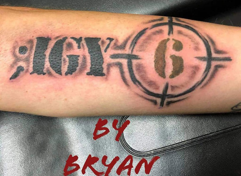 Black IGY6 tattoo
