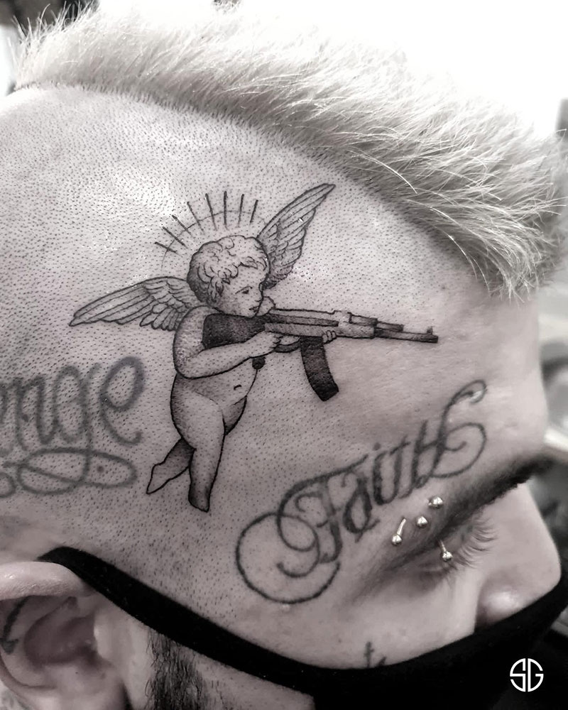 Understanding the Meaning Behind Angel with AK-47 Tattoo A Detailed Guide