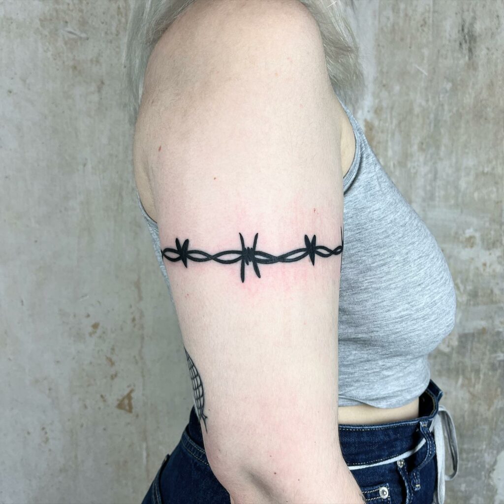 simple barbed wire tattoo