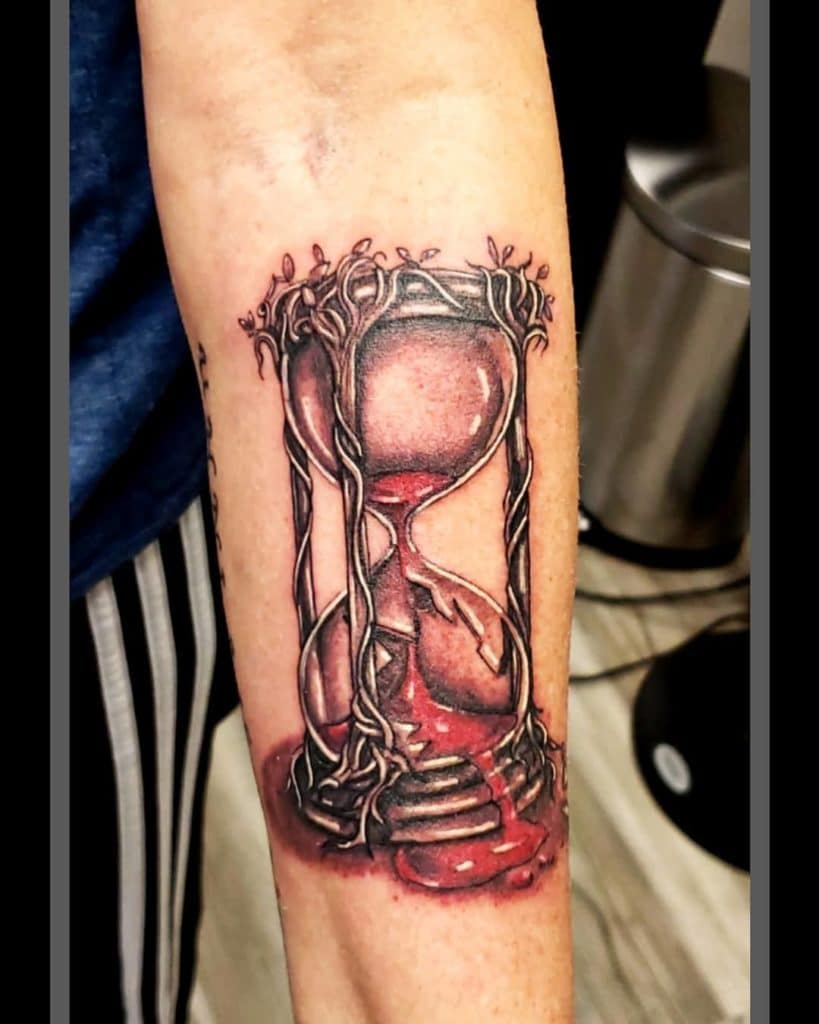 The Meaning Behind Broken Hourglass Tattoos: Capturing the Essence of ...