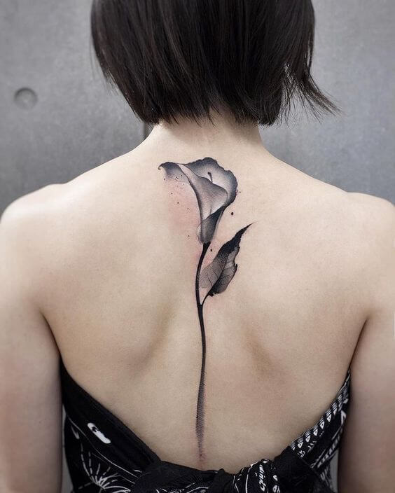 Unlock the Hidden Meaning Behind Calla Lily Tattoos: Symbolic Significance Explained - Impeccable Nest