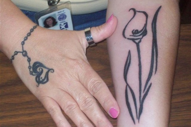 Unlock the Hidden Meaning Behind Calla Lily Tattoos: Symbolic Significance Explained
