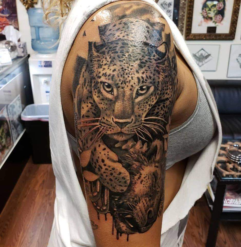 What the Meaning of Cheetah Tattoos Is: all You Need to Know