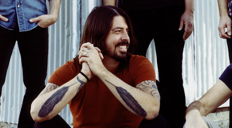 Understanding the Symbolic Meaning: Behind Dave Grohl's Tattoo of a Feather - Impeccable Nest