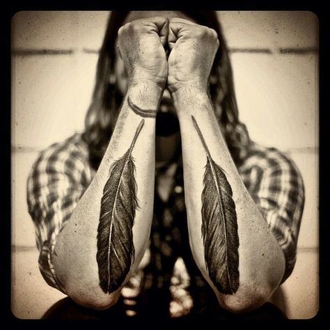 Understanding the Symbolic Meaning Behind Dave Grohl's Tattoo of a Feather