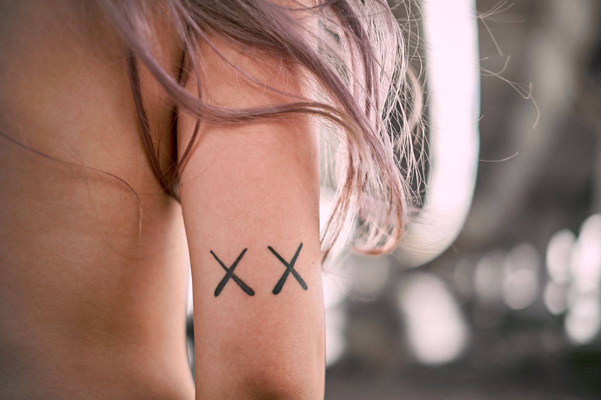 Understanding the Meaning of KAWS Tattoo Designs