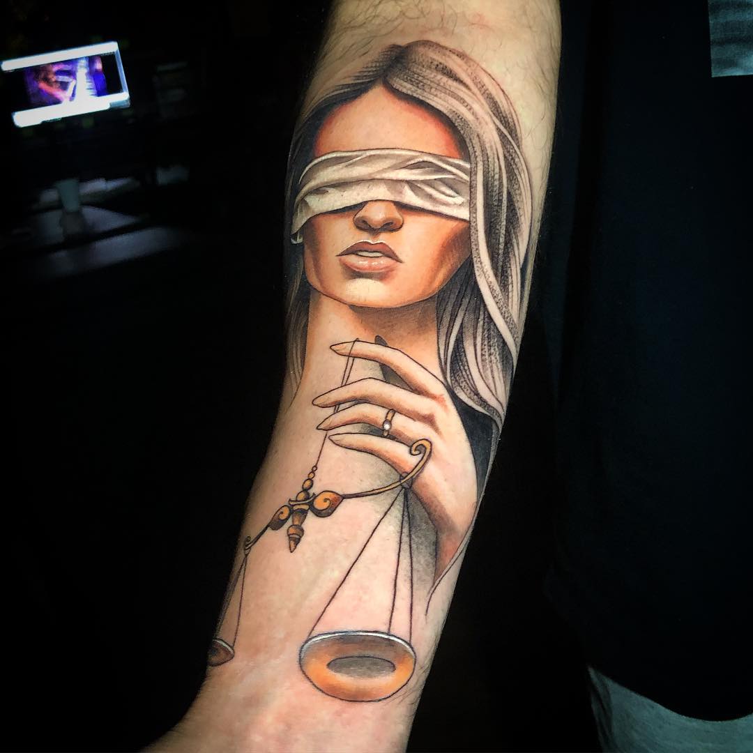 Understanding the Lady Justice Tattoo Meaning
