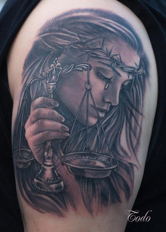 Understanding the Lady Justice Tattoo Meaning