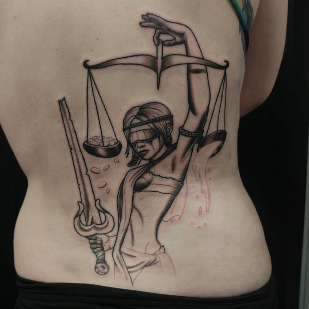 The Symbolism of Lady Justice Tattoos: Uncovering Their Meaning and Power