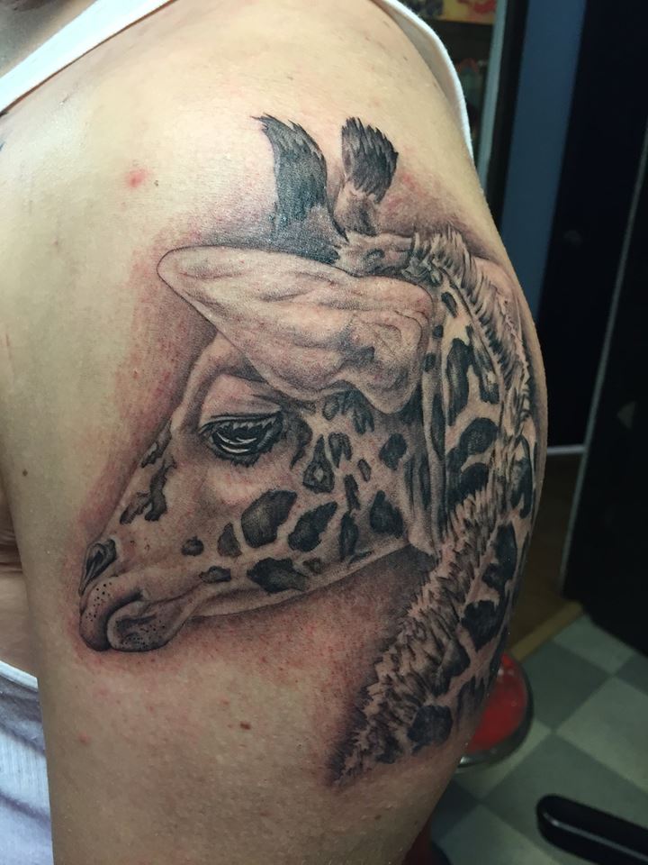 The Meaning of Giraffe Tattoos: A Comprehensive Guide to Finding the Perfect Meaningful Symbol for Your Skin