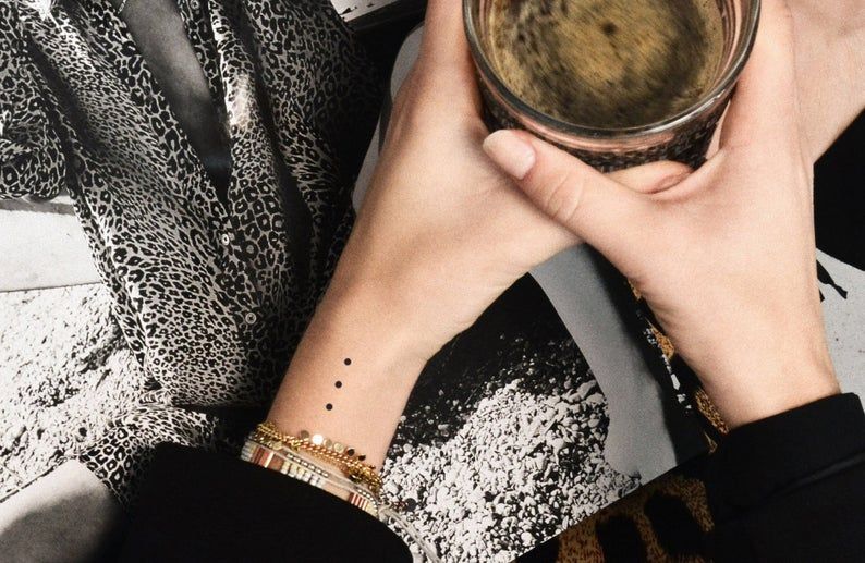 Three Dots in a Row Tattoo Meaning Explained: Unraveling the Mystery of this Symbolic Ink