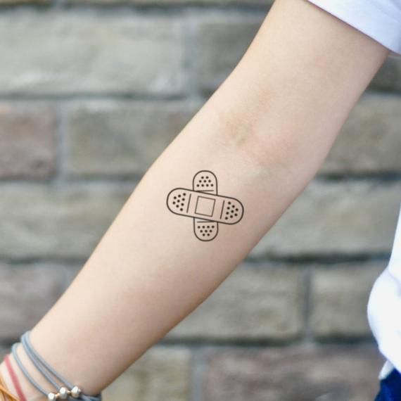 Understanding a Band Aid Tattoo Meaning: What is the Significance?