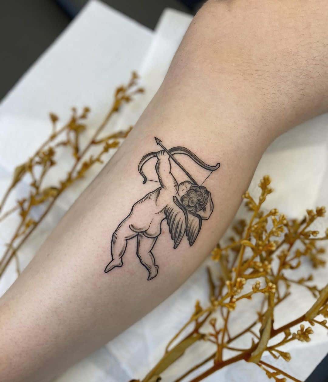 Cupid tattoo meaning