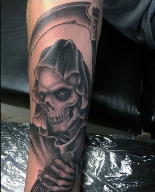 The Meaning of Grim Reaper Tattoos : Embracing Mortality with Art - Impeccable Nest