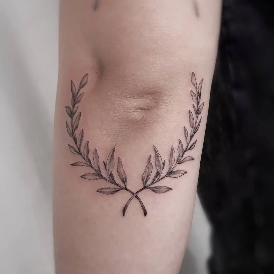 Unveiling the Mystery: What Does the Laurel Wreath Tattoo Mean?