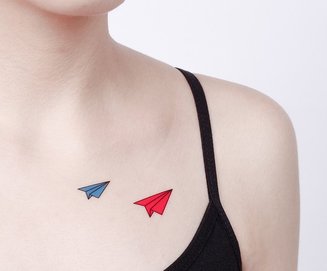 The Meaning Behind a Paper Airplane Tattoo Symbolism and Interpretations