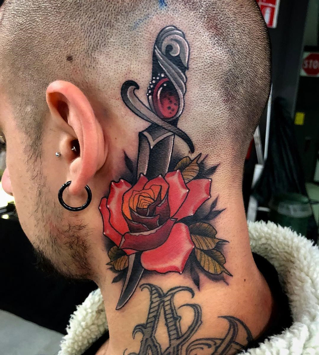Unveiling the Secrets: Rose and Dagger Tattoo Meaning Explored - Impeccable Nest