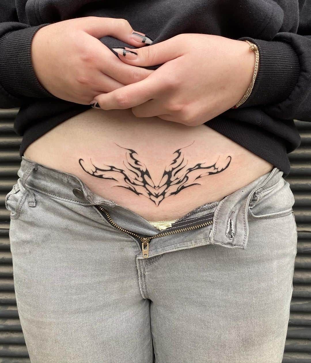 The Meaning Behind Womb Tattoos: Exploring the Symbolism of Female Empowerment - Impeccable Nest