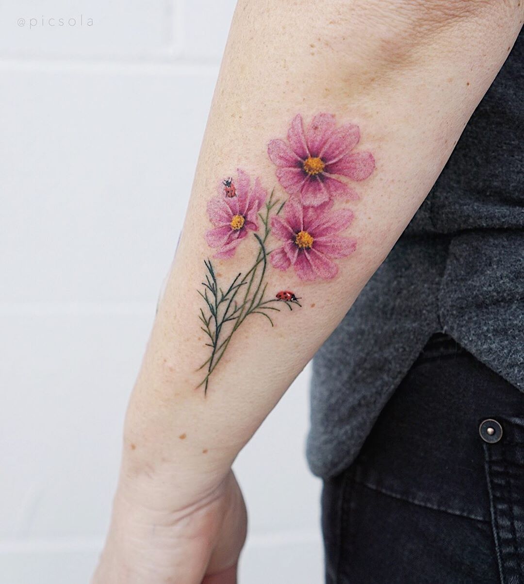 Cosmos Flower Tattoo Meaning: The Deeper Meanings Behind Popular Tattoo Designs - Impeccable Nest