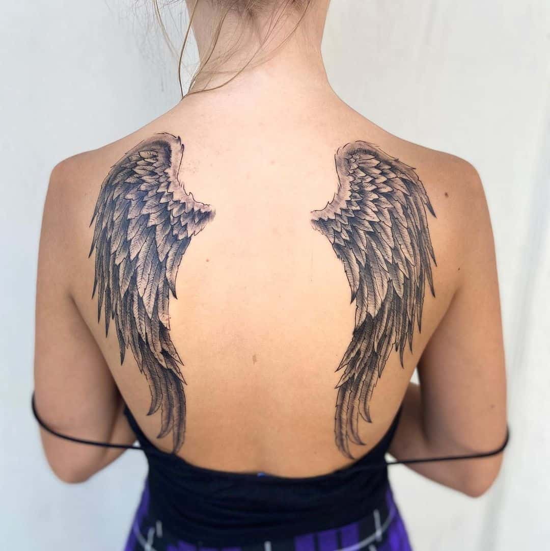 Guardian Angel Feather Tattoo Meaning: A Comprehensive Guide to Symbolism - Impeccable Nest