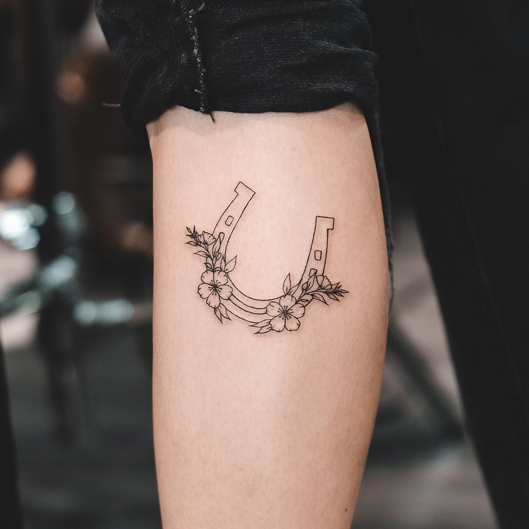Horseshoe Tattoo Meaning: Decoding the Hidden Meanings of Tattoos - Impeccable Nest