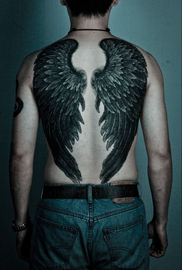 Men's Feather Tattoo Meaning: Exploring the Symbolism and Ideas Behind Feather Tattoos - Impeccable Nest