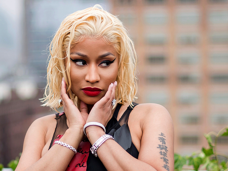 7. Nicki Minaj's "Queen" Tattoo and Its Symbolism - wide 7