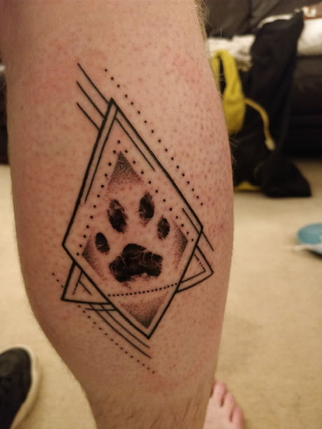 Paw Print Tattoo Meaning: Unleashing the Symbolism Behind this Popular Design Choice
