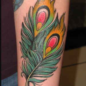 Peacock Feather Tattoo Meaning: A Symbol of Beauty and Glory