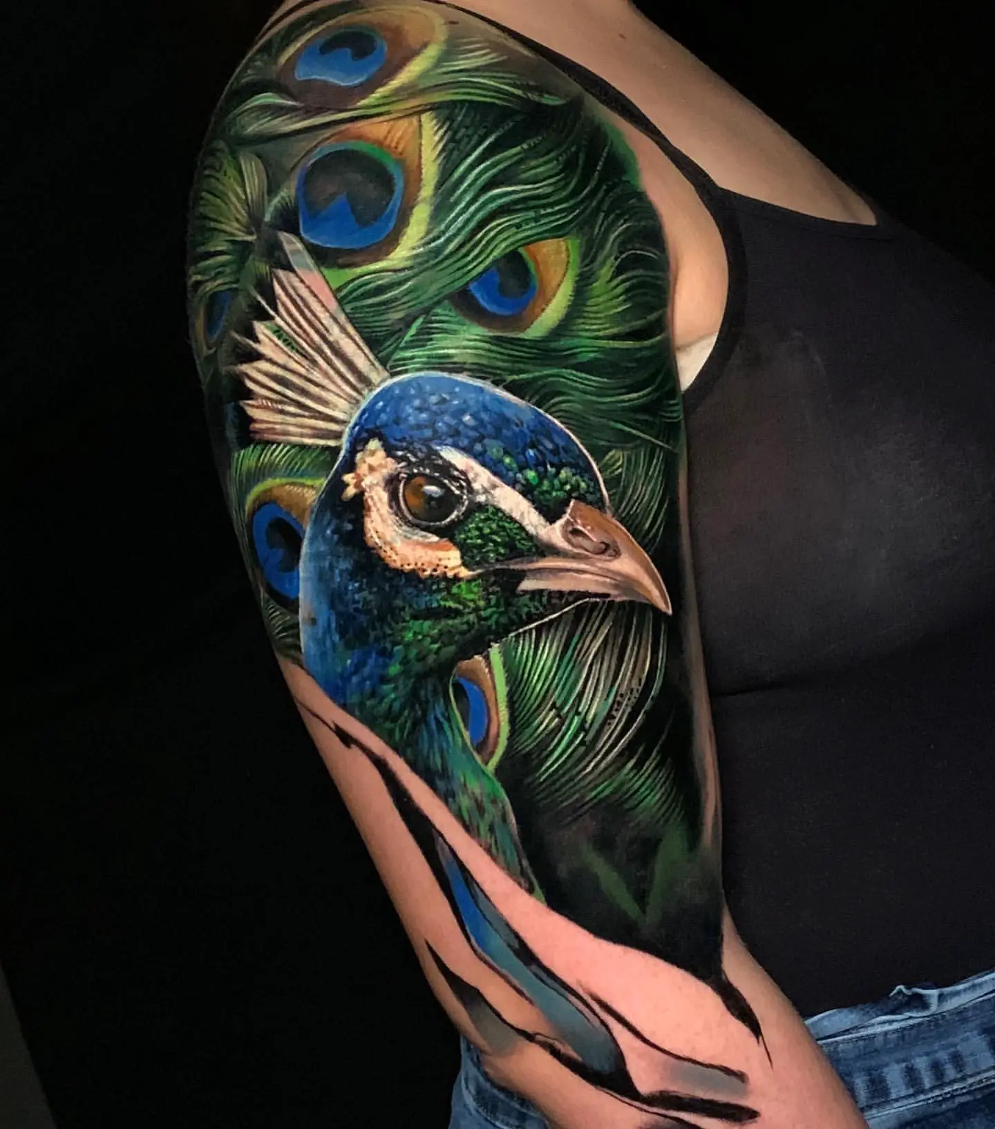 Peacock Tattoo Meaning: Interpreting the Symbolism Behind Your Ink