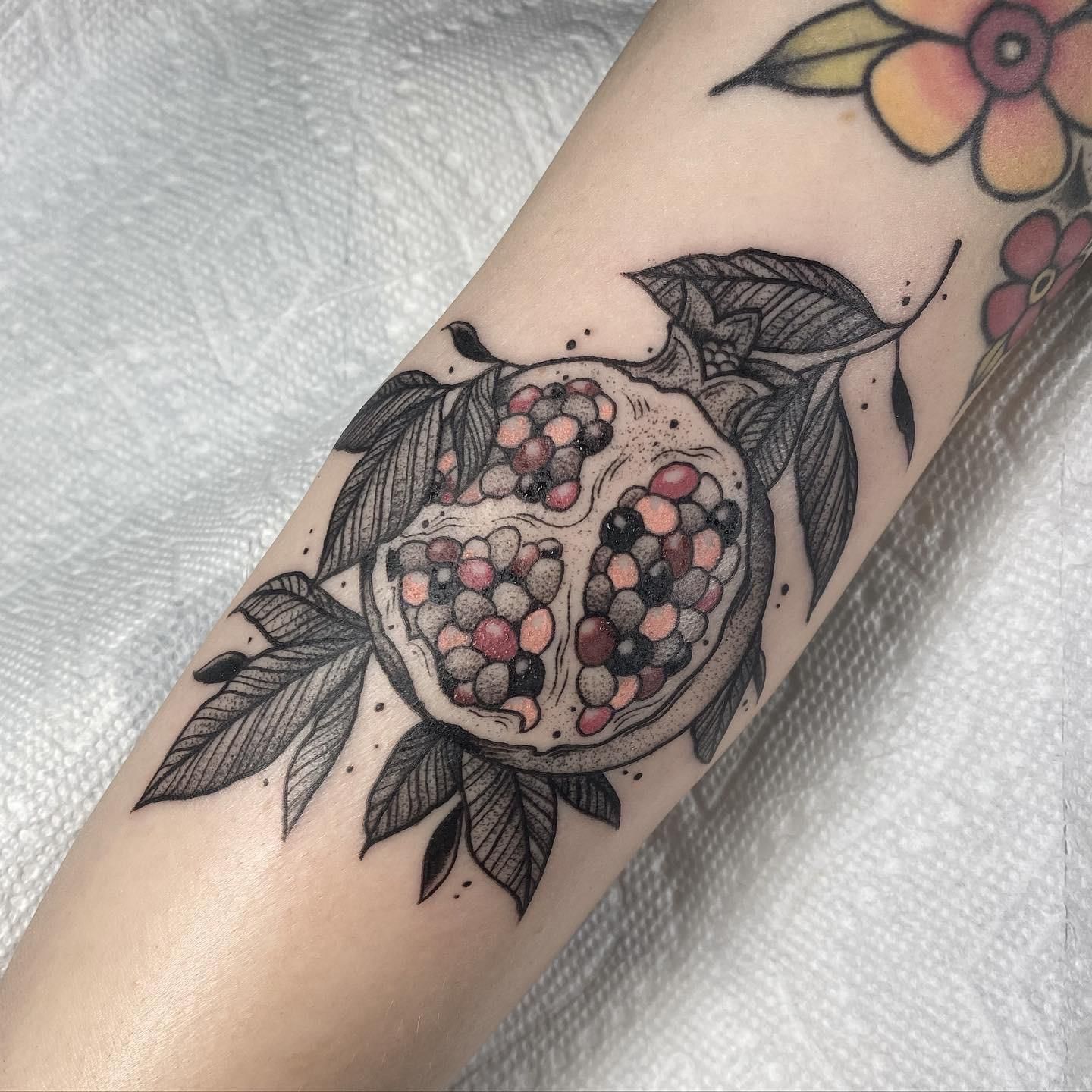 Pomegranate Tattoo Meaning: The Stories Behind Meaningful Tattoo Choices