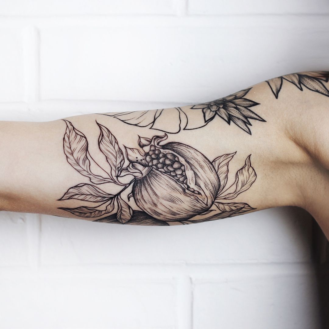 Pomegranate Tattoo Meaning: The Stories Behind Meaningful Tattoo Choices