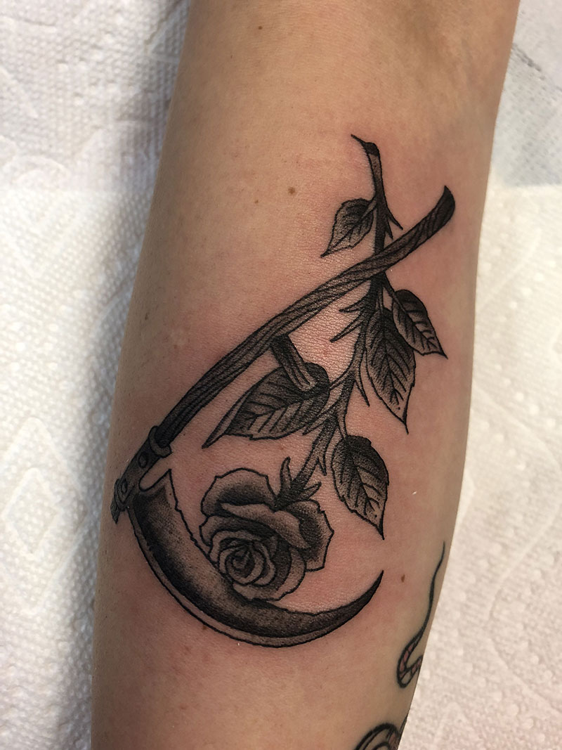 Scythe and rose tattoo meaning