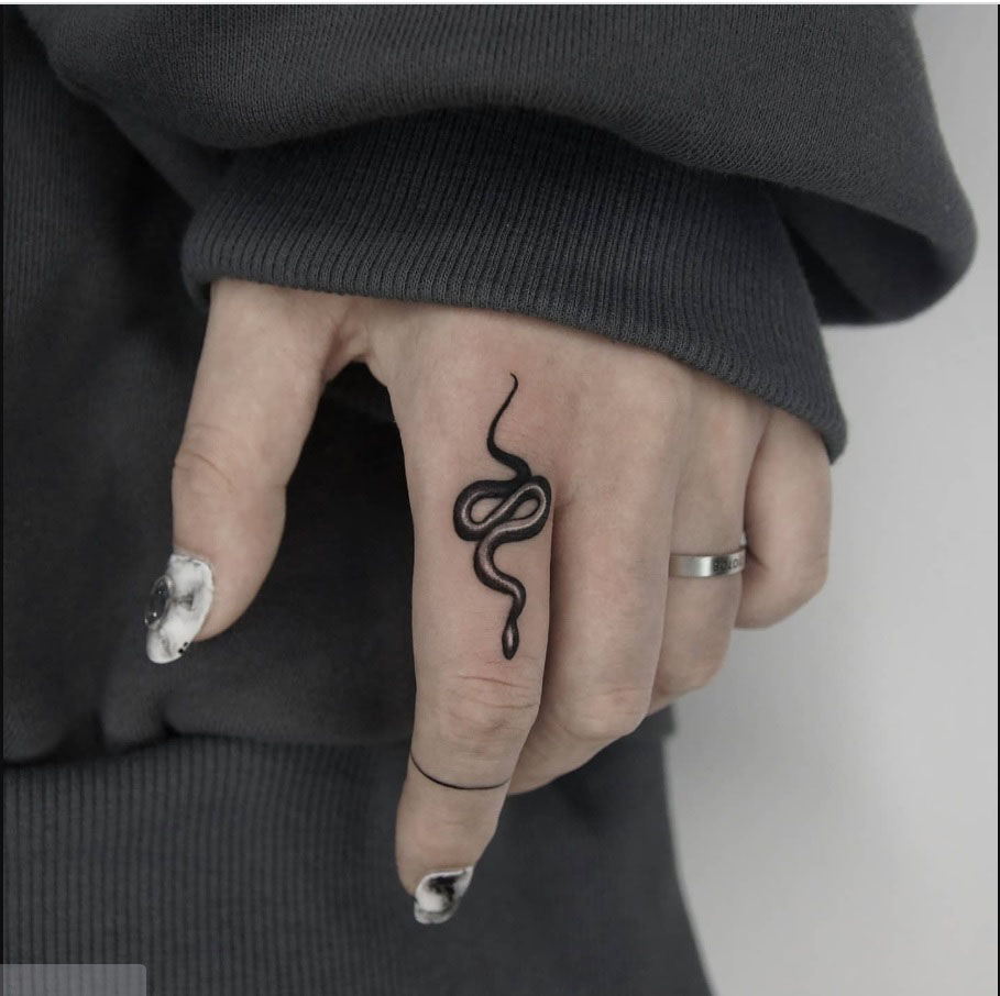 Snake Tattoo on Finger Meaning: Personal Stories and Symbolism Behind Body Art - Impeccable Nest