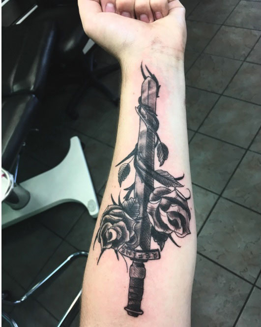 Sword and Rose Tattoo Meaning: Decoding the Hidden Meanings of Tattoos