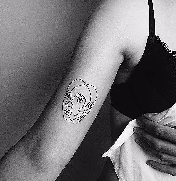 Two Faced Tattoo Meaning: Exploring Tattoo Meanings and Their Cultural Significance