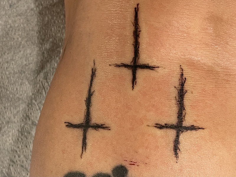 The Upside Down Cross Tattoo Meaning: Interpreting the Symbolism Behind Your Ink