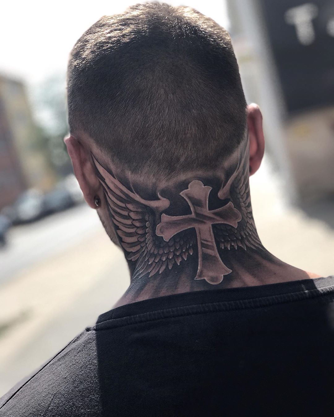Wings on Neck Tattoo Meaning: Delving into Tattoo Meanings and Interpretations