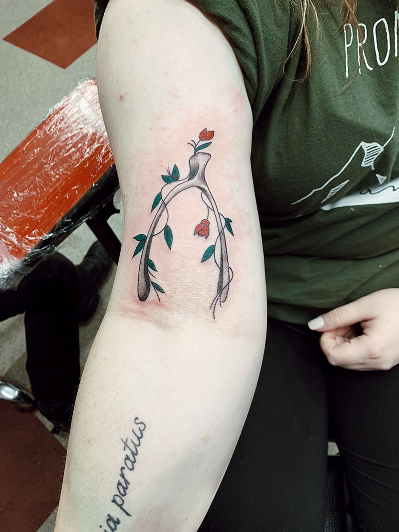 Wishbone Tattoos Meaning: Embrace the Symbolic Power of Arrow Cross Tattoos 