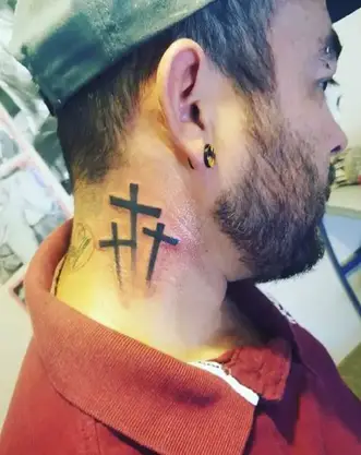 3 Cross Tattoo Meaning: The significance and style of a tattoo featuring three crosses.