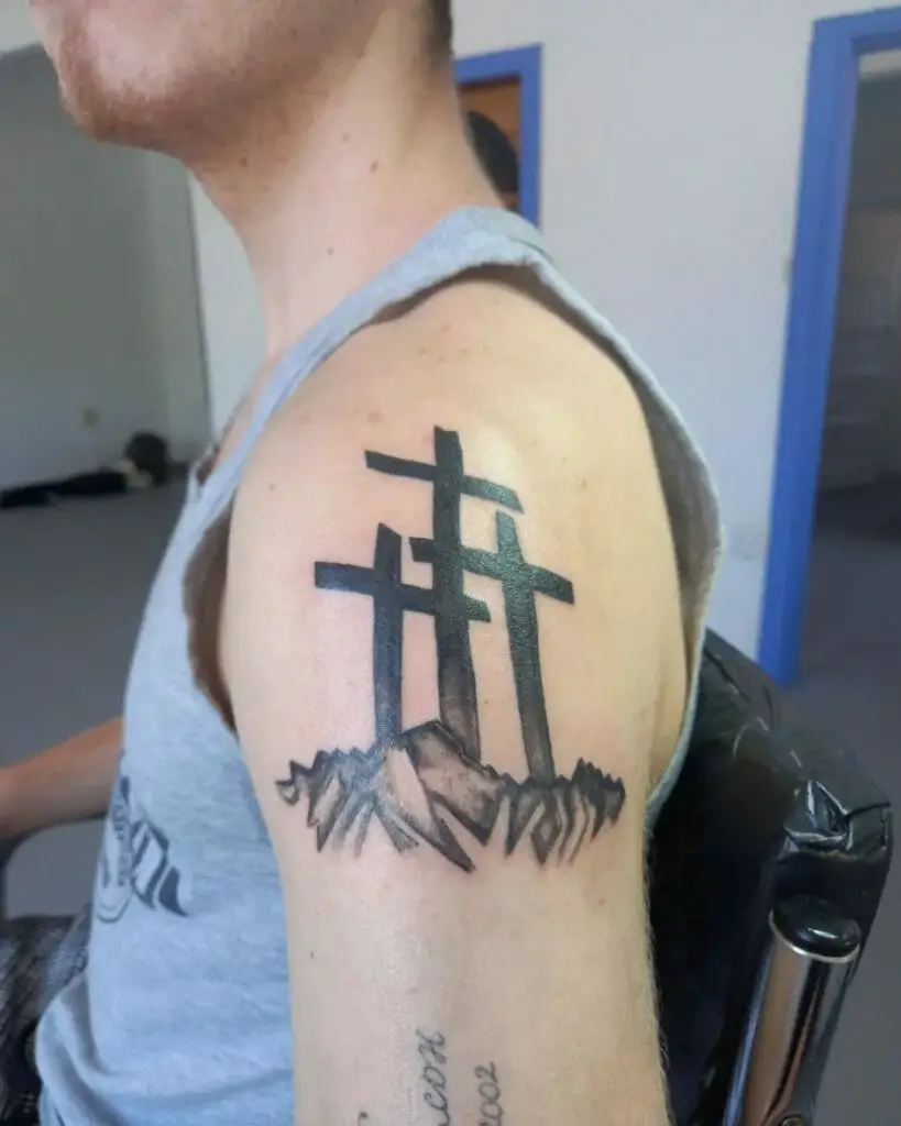 3 Cross Tattoo Meaning: The significance and style of a tattoo featuring three crosses.