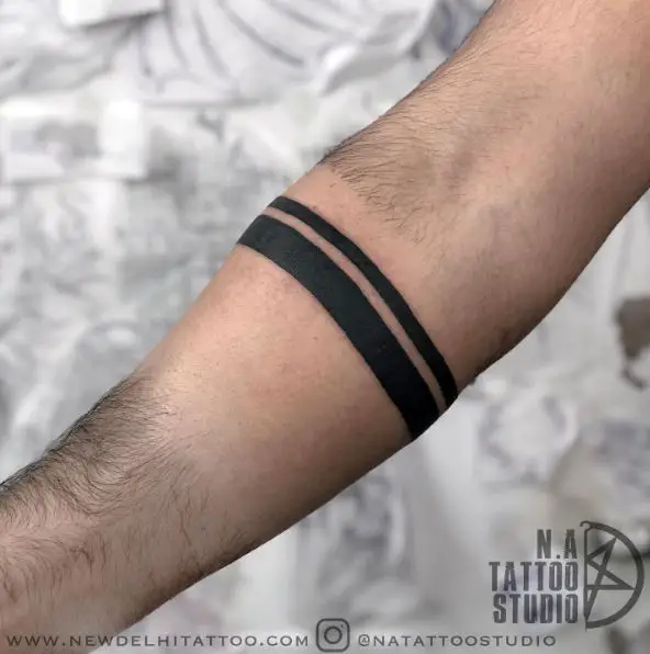 Arm 2 Lines Tattoo Meaning: The profound interpretations behind the two lines tattoo on the arm.