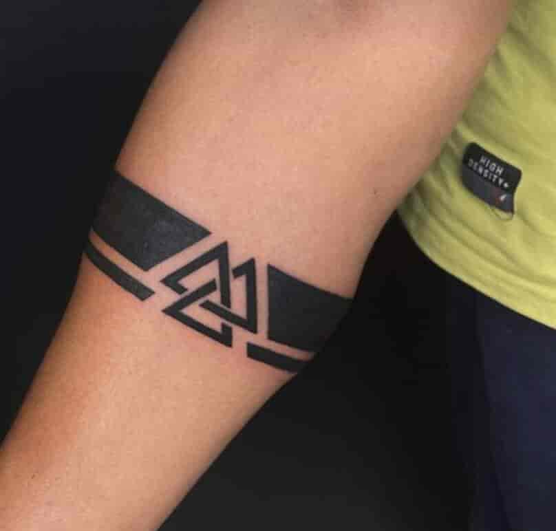 Black Band Tattoo Meaning: The significance and patterns of tattoos that showcase black stripes.