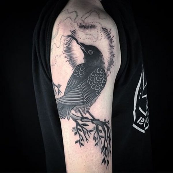 The Mysterious Black Bird Tattoo Design and Meaning