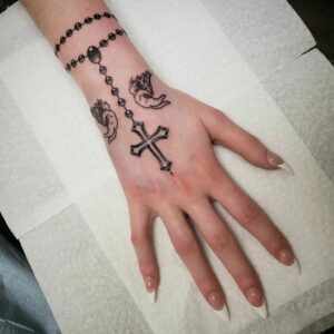 cross-hand-tattoo-meaning-6513d13ec3fe8.jpg