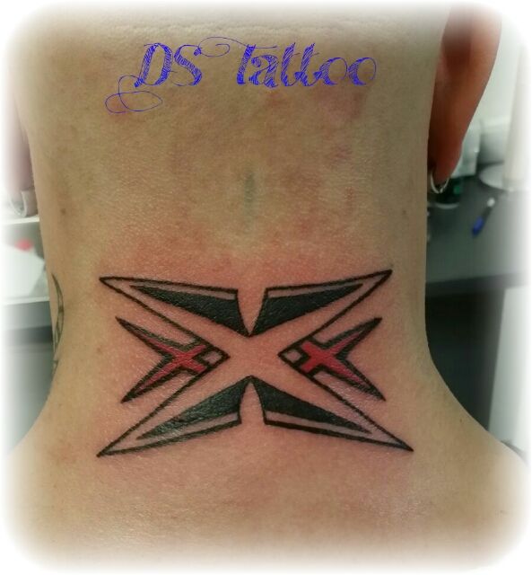 Double X Tattoo Meaning: Comprehending the Significance and Patterns of the Double X Tattoo in the English Language.