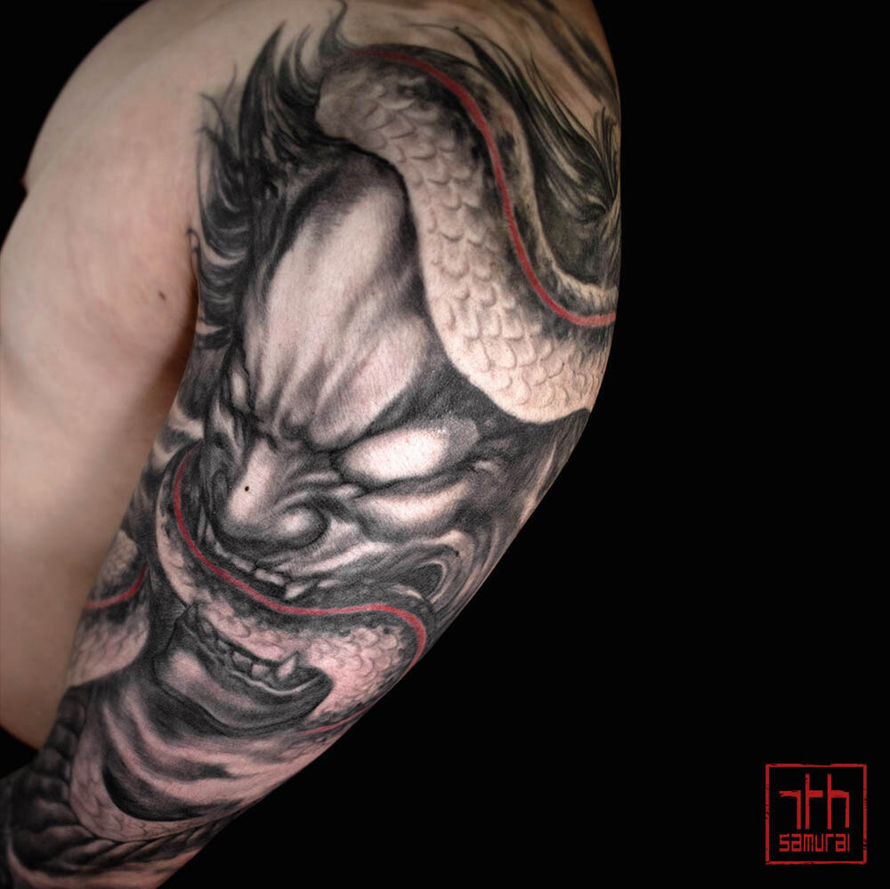 Japanese Mask Tattoo Meaning: The significance and artistic concept behind Japanese mask tattoos.