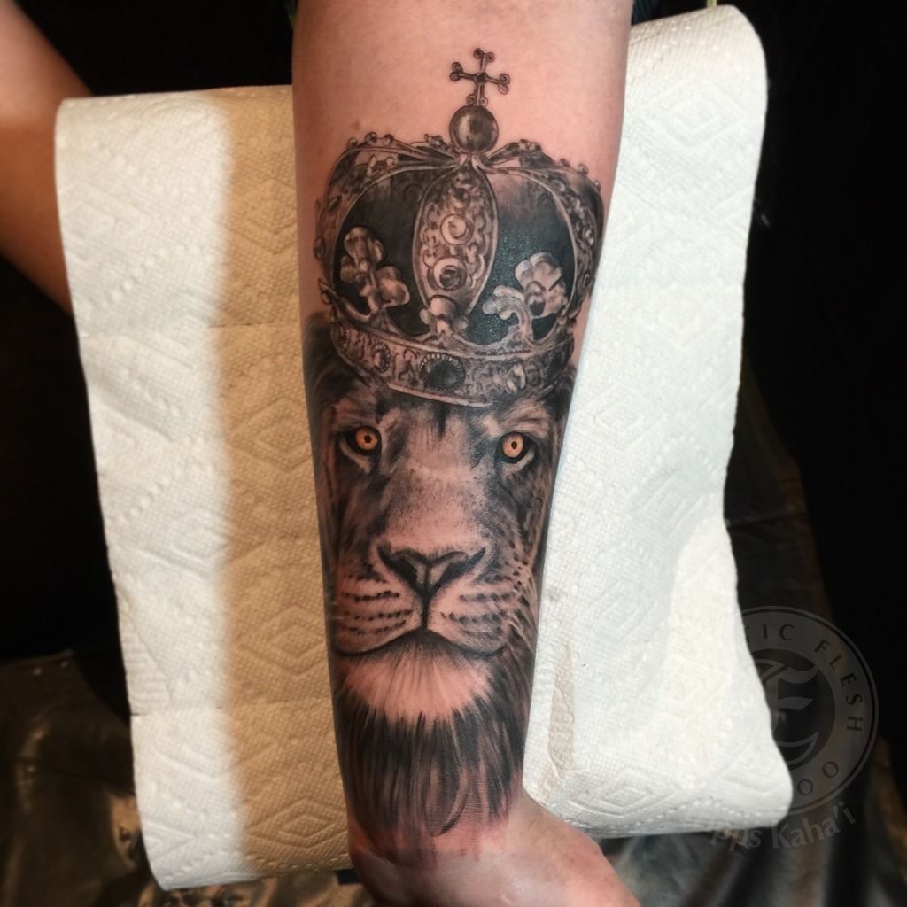 Lion with Crown Tattoo Meaning: The importance of a tattoo that shows a lion wearing a crown.