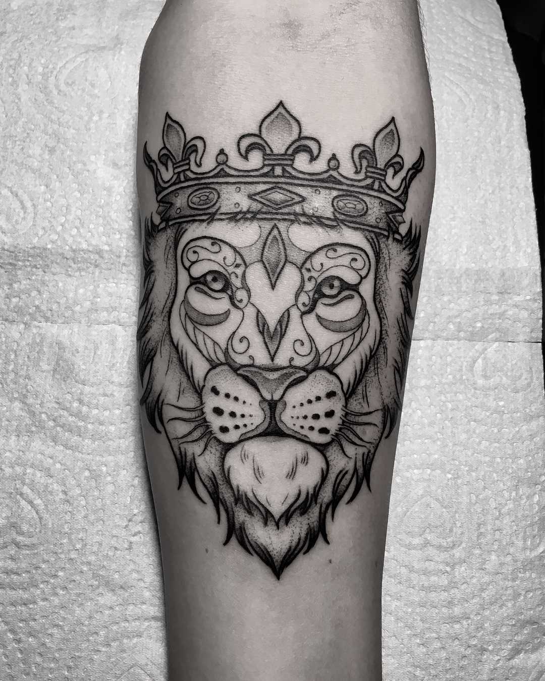 Lion with Crown Tattoo Meaning: The importance of a tattoo that shows a lion wearing a crown.