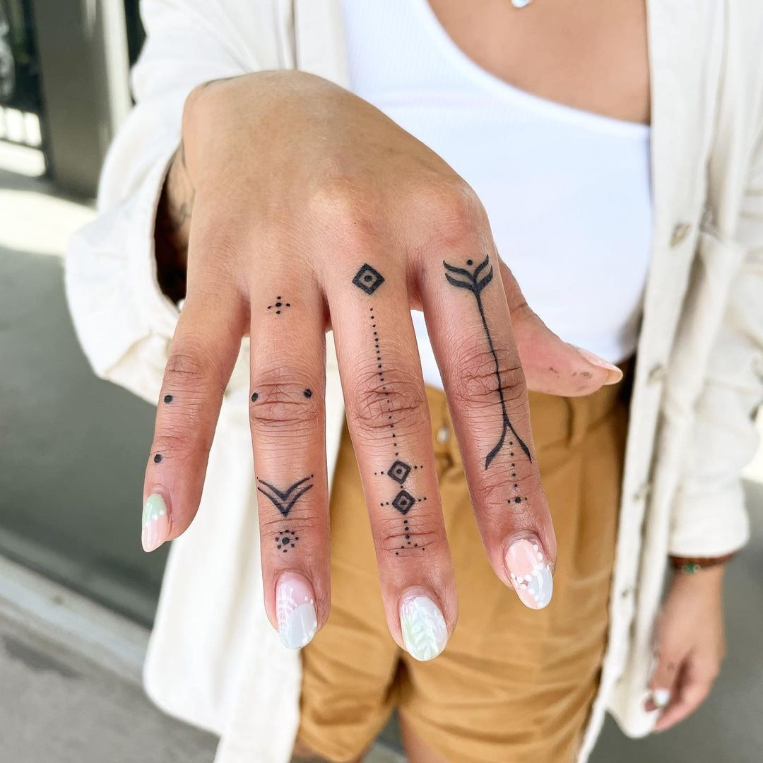 Nail Tattoo Meaning: Personal Stories and Symbolism Behind Body Art - Impeccable Nest